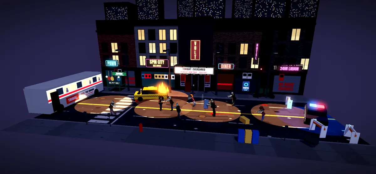 Main Street at night under sodium lights and neon.
