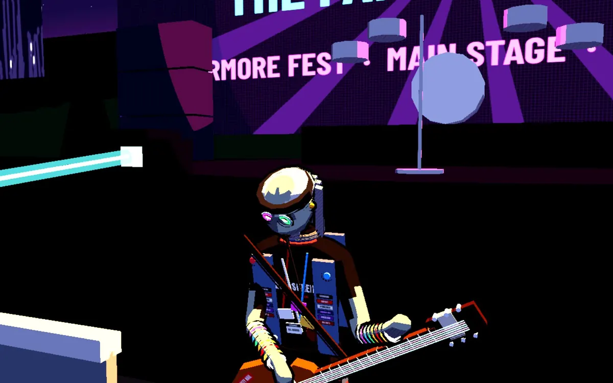 The rock star plays guitar at the festival.
